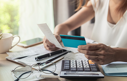 Woman checking bills