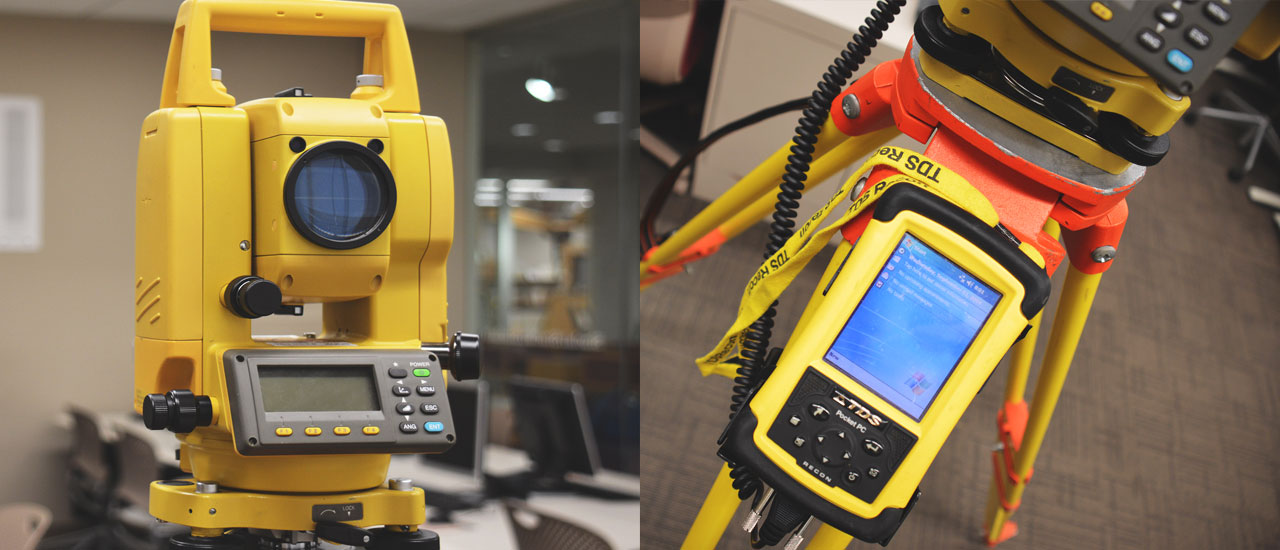 Student using a Trimble tool for surveying.