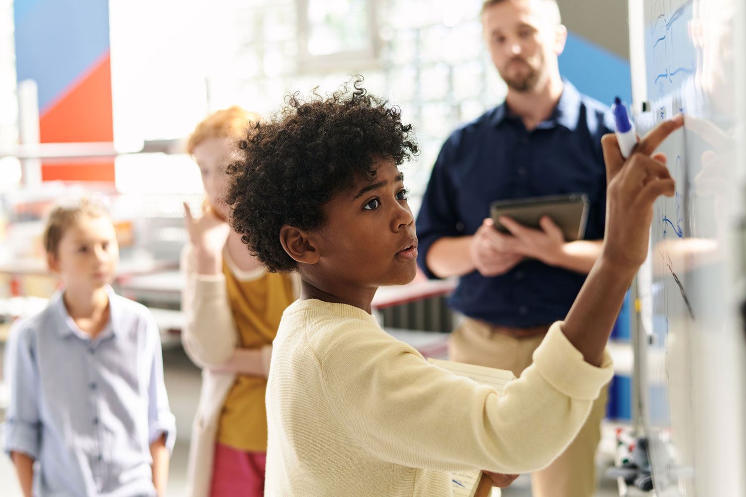 K–12 students participating in a STEM outreach activity