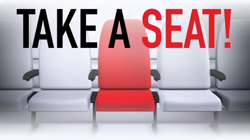 Take a Seat text with image of theatre seats