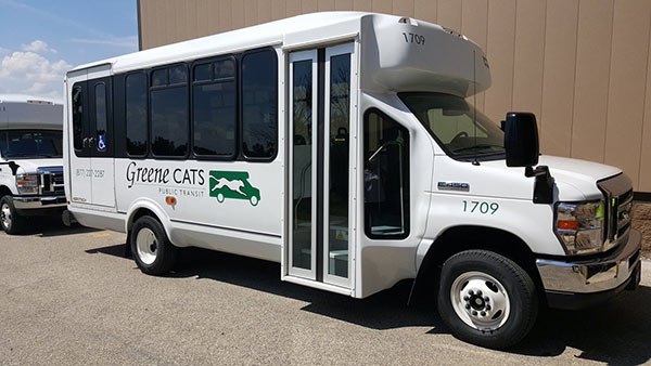 Green Cats transportation bus at a Dayton stop.